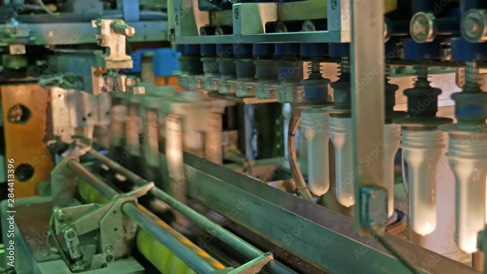 Plastic bottles for dairy products in the production factory line Plastic bottles for dairy products in the production factory line