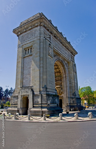 A drive by of arch square in Bucharest Romania.