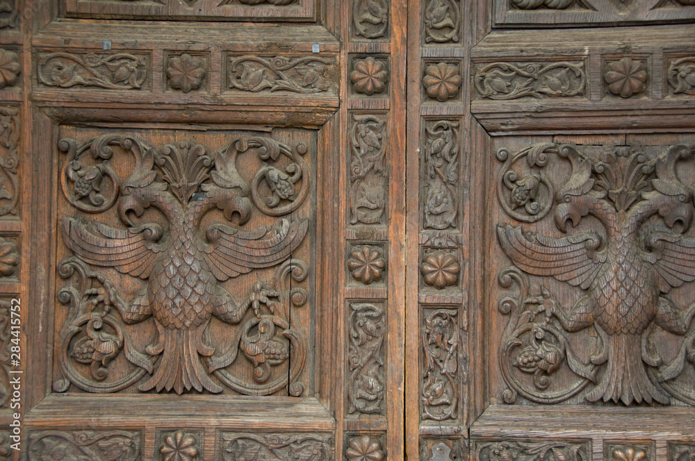 Russia, Yaroslavl, Golden Ring city on the banks of the Volga. Alexander Nevsky church, ornate wooden doors.