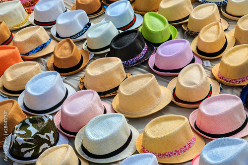 Spain, Balearic Islands, Mallorca, Palma de Mallorca, hats for sale in street market.