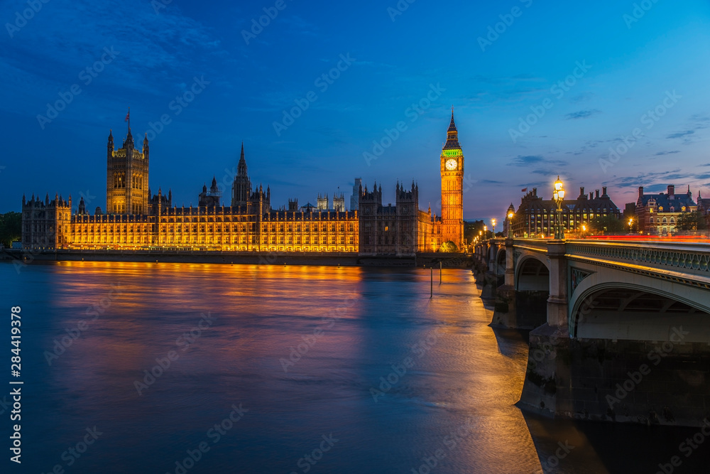 Naklejka premium England, London. Parliament and Westminster Bridge at twilight. Credit as: Dennis Kirkland / Jaynes Gallery / DanitaDelimont.com.
