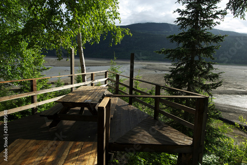 Принти на полотні Peaceful sundeck overlooking a riverbed