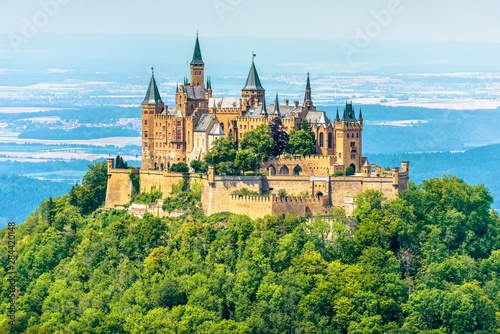 Hohenzollern Castle on mount top, Germany. Scenic view of Burg Hohenzollern in summer. Landscape of Swabian Alps with Gothic castle.