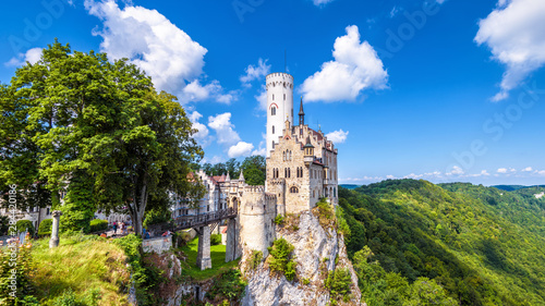 Lichtenstein Castle in Baden-Wurttemberg, Germany. Scenic panorama of old castle on cliff. Mountain landscape of Swabian Alps.