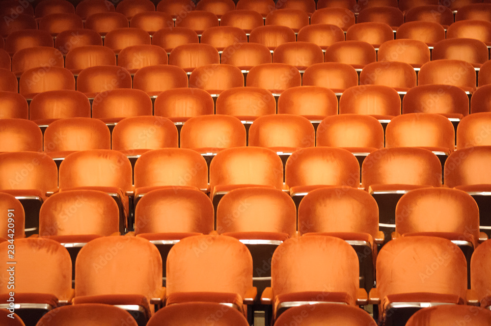 Fototapeta premium Empty orange seats in auditorium.