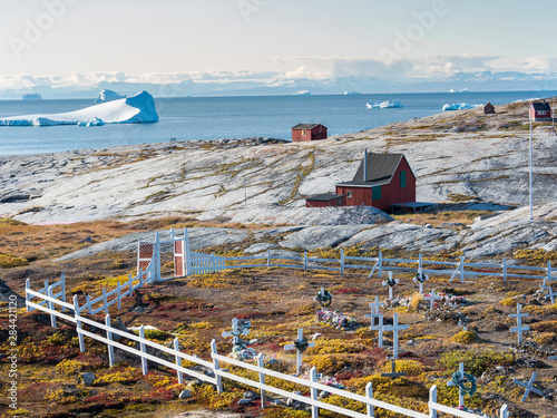 The cemetery. Inuit village Oqaatsut (once called Rodebay) located in the Disko Bay, Greenland, Denmark photo