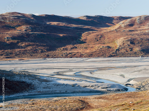 Meltwater streams and Sandur close to Russell Glacier. Landscape close to the Greenland Ice Sheet near Kangerlussuaq, Greenland, Denmark