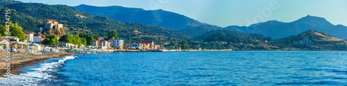 Lesvos island . Greece. Beautiful coastal village Petra with famous monastery on the rock and great beach