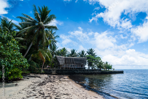 Traditional thatched roof hut, Yap Island, Micronesia photo