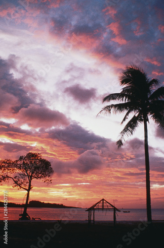 Micronesia, Pohnpei, View of Kolonia Pwohmaria Resort beach at sunrise