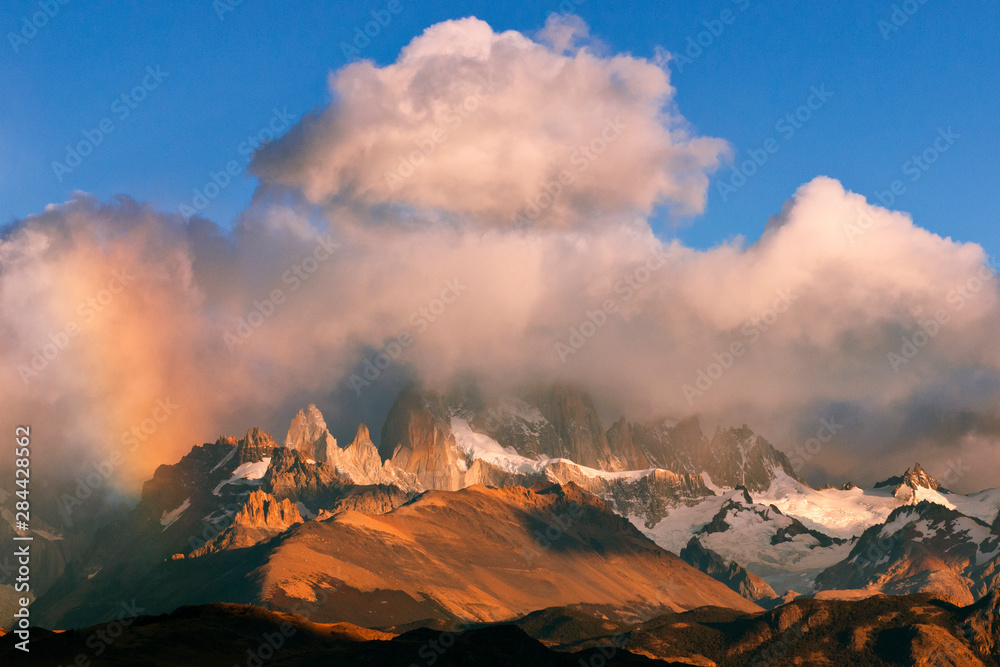 Argentina, Patagonia, Los Glaciares National Park, Mount Fitz Roy sunrise with partial rainbow. Credit as: Dennis Kirkland / Jaynes Gallery / DanitaDelimont.com