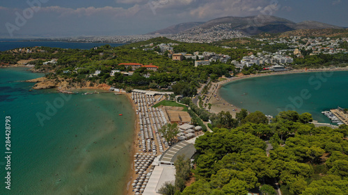 Aerial drone photo from famous Astir or Asteras sandy beach in south Athens riviera, Vouliagmeni Peninsula, Greece © aerial-drone