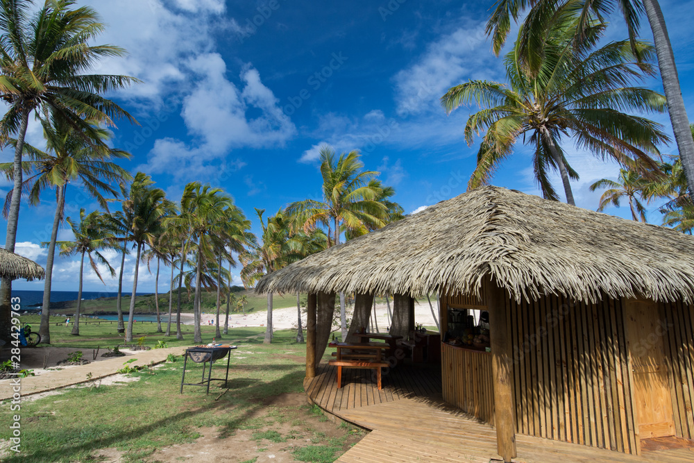 Easter Island aka Rapa Nui, Anakena. Rapa Nui National Park, UNESCO World Heritage Site. View of park facility that includes restrooms and food vendor hut. Easter Island aka Rapa Nui, Anakena. Rapa Nui National Park, UNESCO World Heritage Site. View of park facility that includes restrooms and food vendor hut.