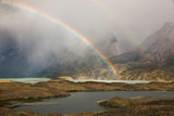 Chile, Torres del Paine National Park. Double rainbow reaches to Lake Nordenskjold. 
