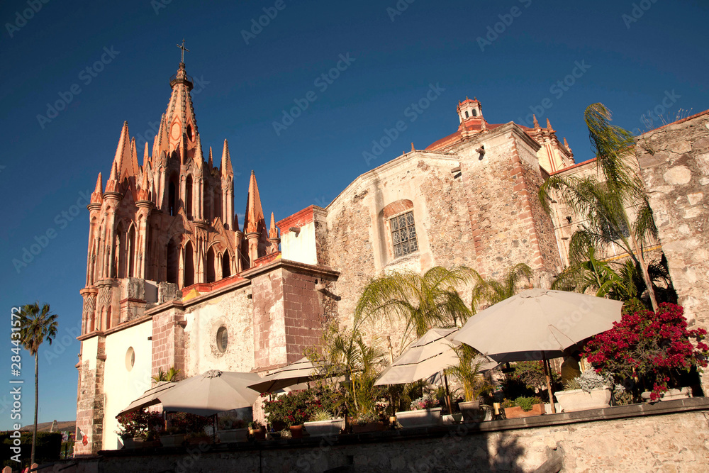 North America, Mexico, San Miguel de Allende, La Parroquia de San Miguel Church, with restaurant on terrace below. The city is a UNESCO World Heritage Site.