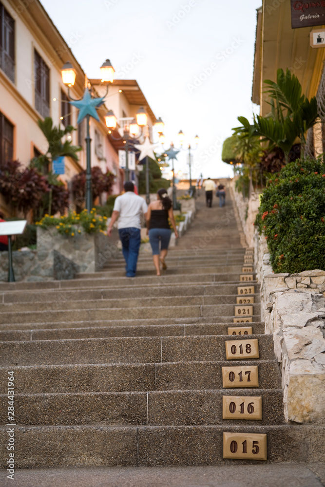 Ecuador, Guayaquil. Numbered steps, over 400 in total, lead up from the Malecon to the Barrio Las PeÒas, a tourist attraction.