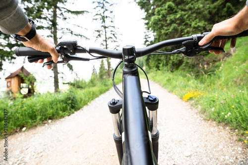 Man Riding Electric Mountain Bike