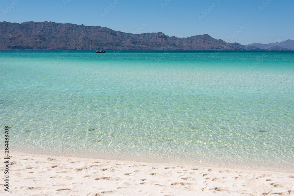 Mexico, Baja California Sur, Sea of Cortez. White sand beach and calm waters Isla Coronado