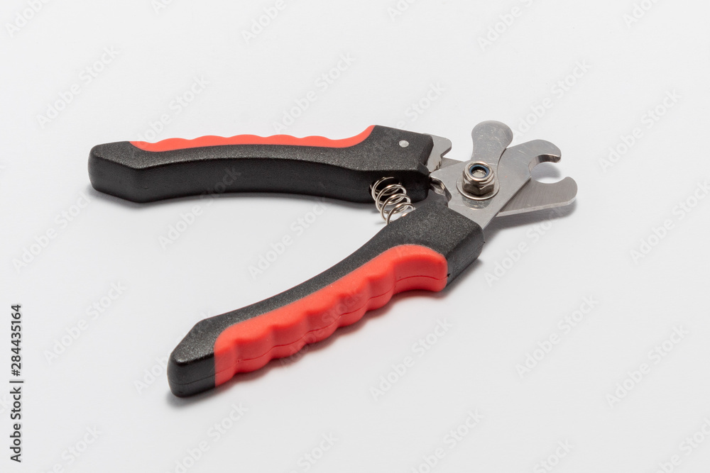 Pet claw cutters. Isolated on white background. Pet claw cutters. Isolated on white background.