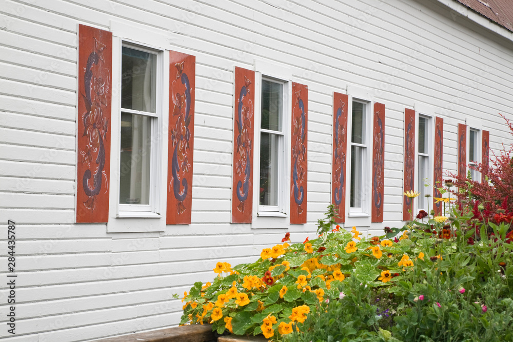USA, Alaska, Petersburg. Rosemaling paintings on window shutters of Sons of Norway Hall. 