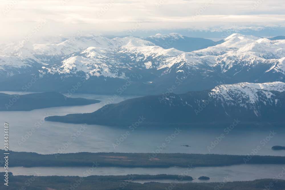 US, Alaska, Aerial view of Coast Range approaching Juneau International Airport. Called 'island city' because no roads access it