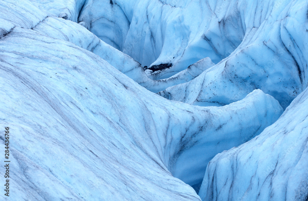 Fototapeta premium Glacier formations as seen while ice hiking on Root Glacier in Alaska