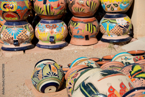 USA, Arizona, Tucson, Tubac. Colorful traditional hand painted Mexican pottery.. photo