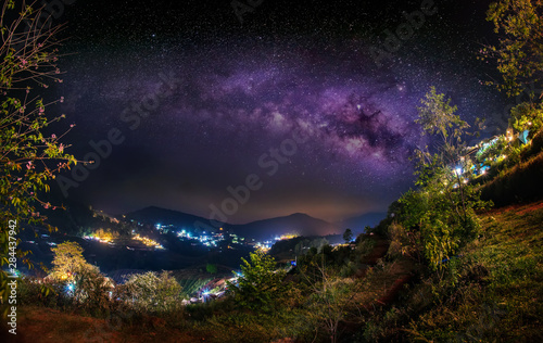 Milky Way galaxy in the darkest night with beautiful mountain shape in Mon Jam, Chiang Mai, Thailand,Long exposure photograph, with grain.Image contain certain grain or noise and soft focus.