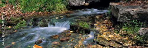 Fototapeta Naklejka Na Ścianę i Meble -  USA, Arkansas, Winton Springs. Winton Springs cascades gently through the countryside in Washington Co., Arkansas.