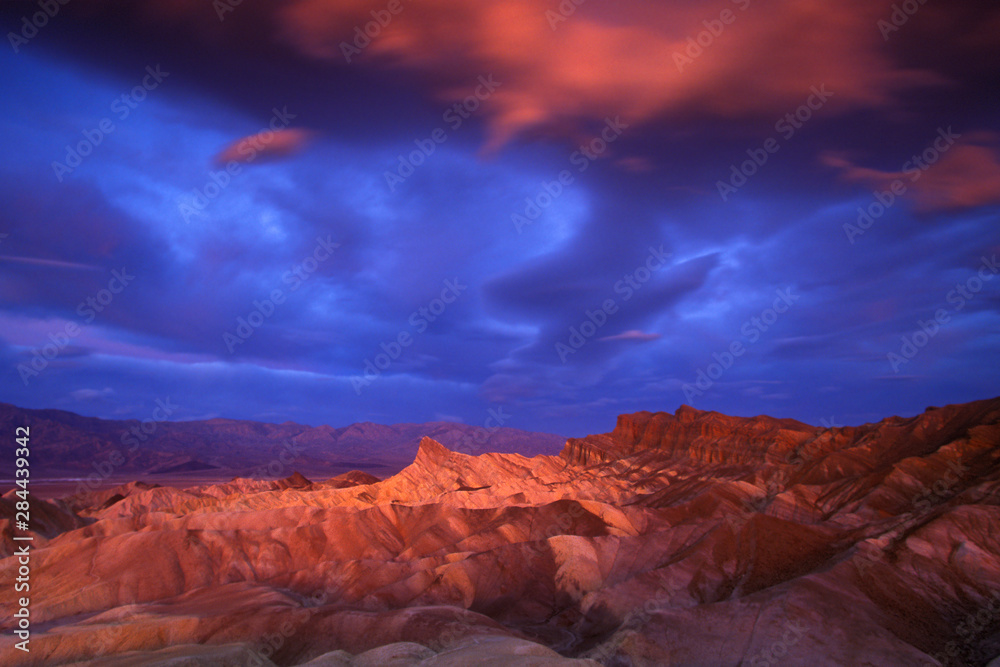 USA, California, Death Valley National Park. Dramatic sunrise at Zabriskie Point.