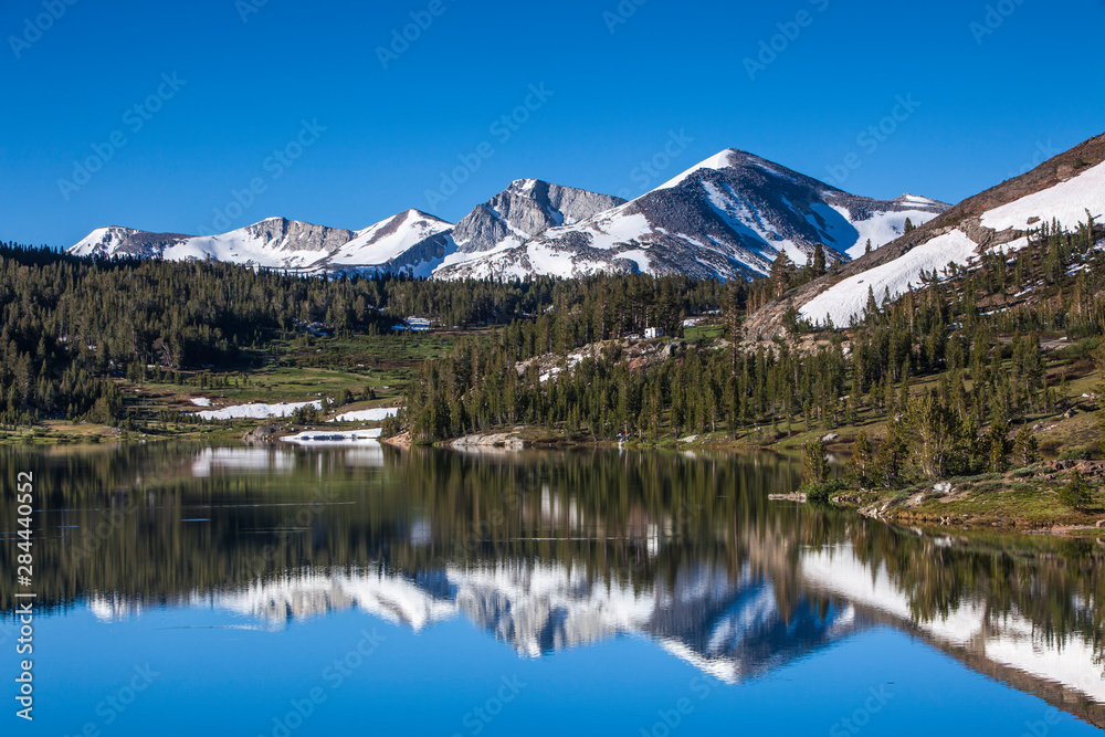 Yosemite National Park. The Kuna Crest and Mammoth reflections in Tioga Lake.