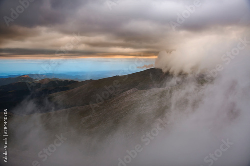 USA, Colorado, Front Range. Storm clouds over mountains. 