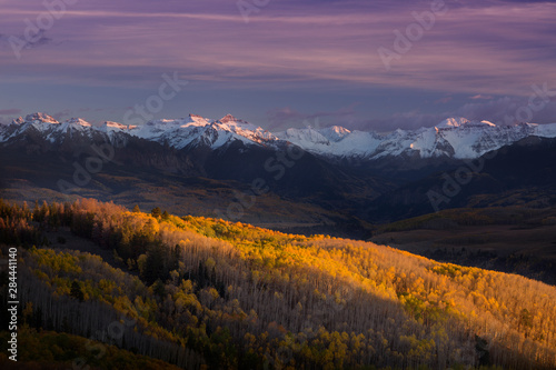 USA  Colorado  San Juan Mountains. Sunset bathes an aspen forest. 