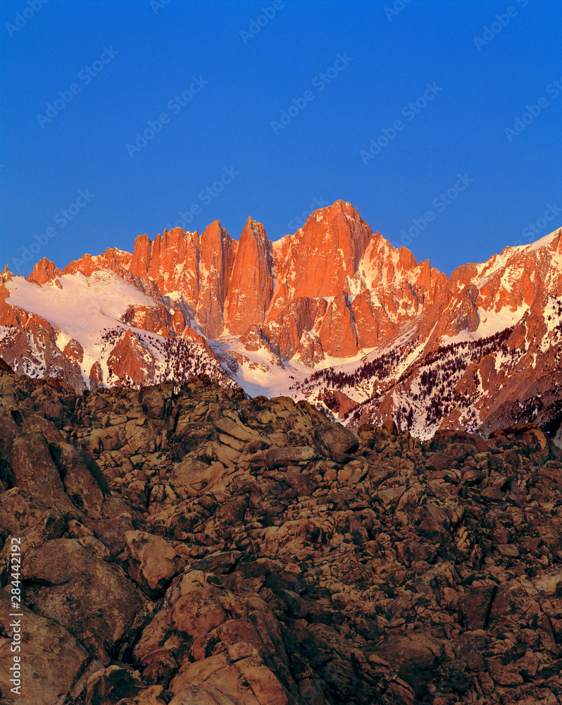 USA, California, Mt Whitney. Sunrise colors the rocks pink at Mt Whitney, California.