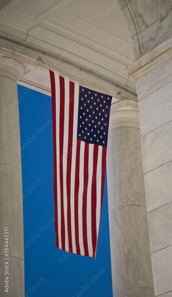 USA, VA, Arlington. American Flags are hung around the Ampitheater located adjacent to the Tomb of the Unknown Soldier at Arlington National Cemetery.