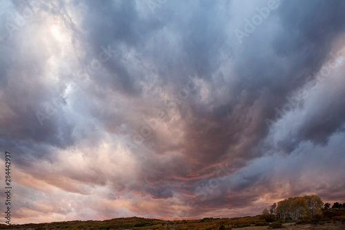 USA, Colorado, San Juan Mountains. Storm clouds at sunset. 