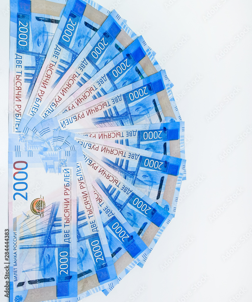 Russian money banknotes in nominal value of two thousand. New tickets of the bank of Russia. Russian money. Russian money banknotes in nominal value of two thousand. New tickets of the bank of Russia. Russian money.