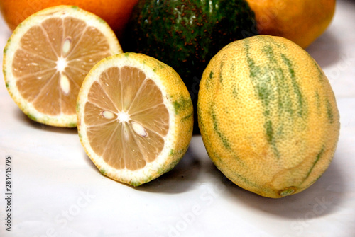 USA, Hawaii, Big Island, Hilo. OK Farms. Locally grown produce: variegated lemons (used for pink lemonde), oranges, avocado photo