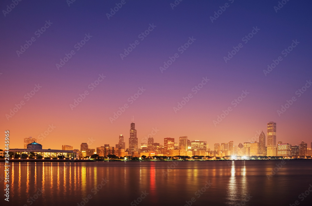USA, Illinois, Chicago. Sunset skyline and Lake Michigan. 