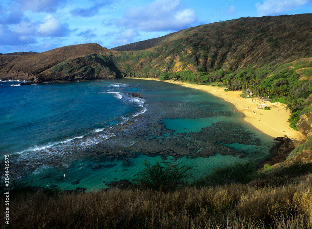 Beautiful turquoise Hanauma Bay shimmers near Honolulu on Oahu in Hawaii.