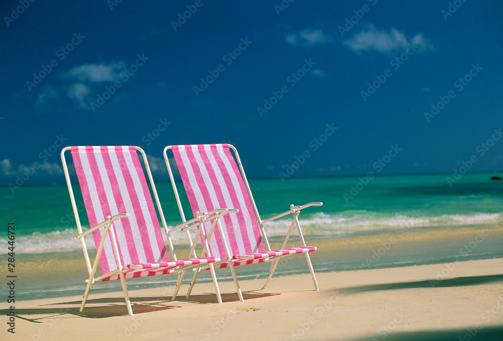 USA, Hawaii. Beach chairs
