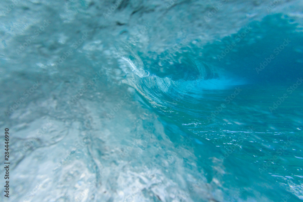 Fisheye view of wave breaks at Kua Beach, North of Kona, Big Island, Hawaii