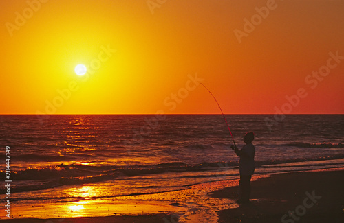 North America, USA, Florida, Sanibel Island. Fishing at sunset.