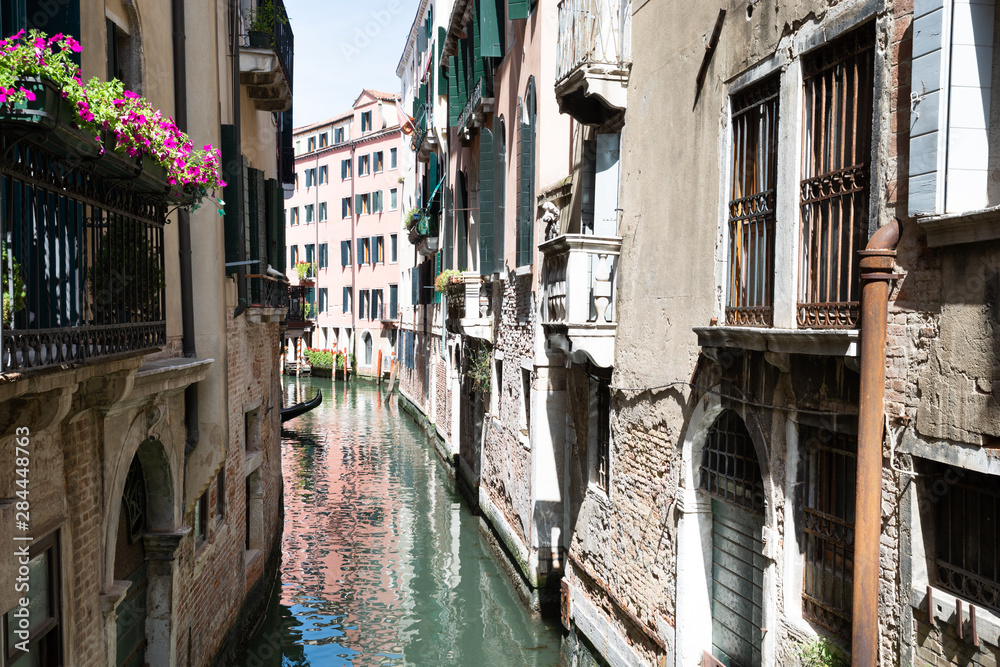 Narrow Canal And Old Historic Houses In Venice
