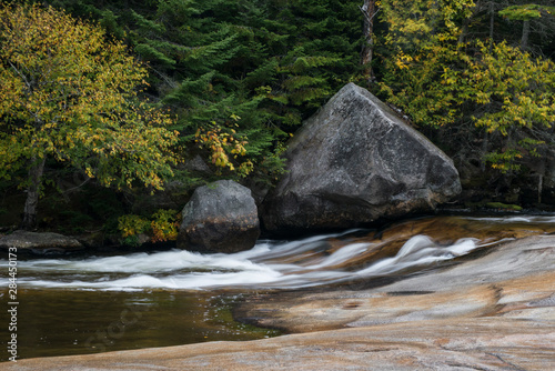 USA, Maine, Ledge Falls with triangular and round boulders at Baxter State Park photo