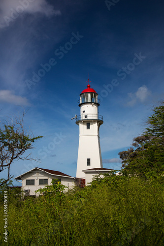 USA  Hawaii  Oahu  Morning light on Diamond Head Lighthouse with Puffy Clouds
