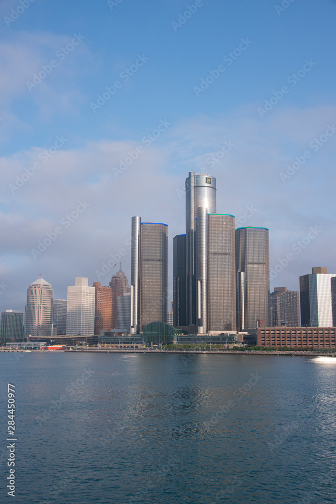 Michigan, Detroit River, located in the Great Lakes between Lake St. Clair and Lake Erie. International border between U.S. and Canada. River view of downtown Detroit, with General Motors building. Michigan, Detroit River, located in the Great Lakes between Lake St. Clair and Lake Erie. International border between U.S. and Canada. River view of downtown Detroit, with General Motors building.