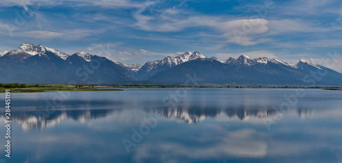 Panorama of Nine Pipes National Wildlife Refuge and the Mission Mountains © Darrell Gulin/Danita Delimont