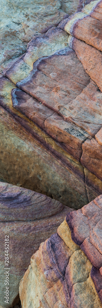 USA, Nevada. Colorful abstract lines in sandstone rocks at Valley of Fire State Park USA, Nevada. Colorful abstract lines in sandstone rocks at Valley of Fire State Park
