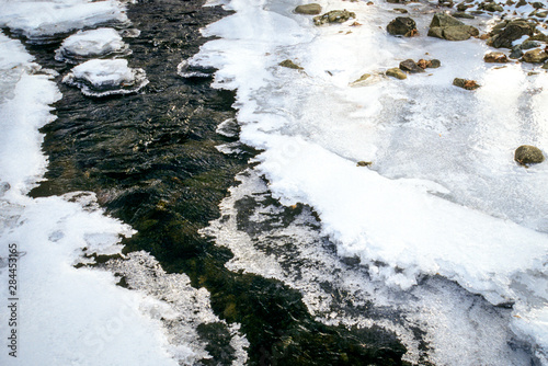 USA, New Jersey, Hunterdon, Mountainville, Rockaway Creek with ice. photo